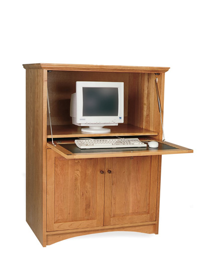 If your home office must remain in your bedroom, place it inside something you can close up, such as this FSC-certified Vertical Office Center from Vermont Woods.